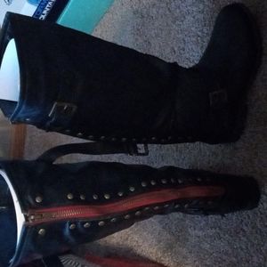 Black knee high boots with rivets and red detail worn once